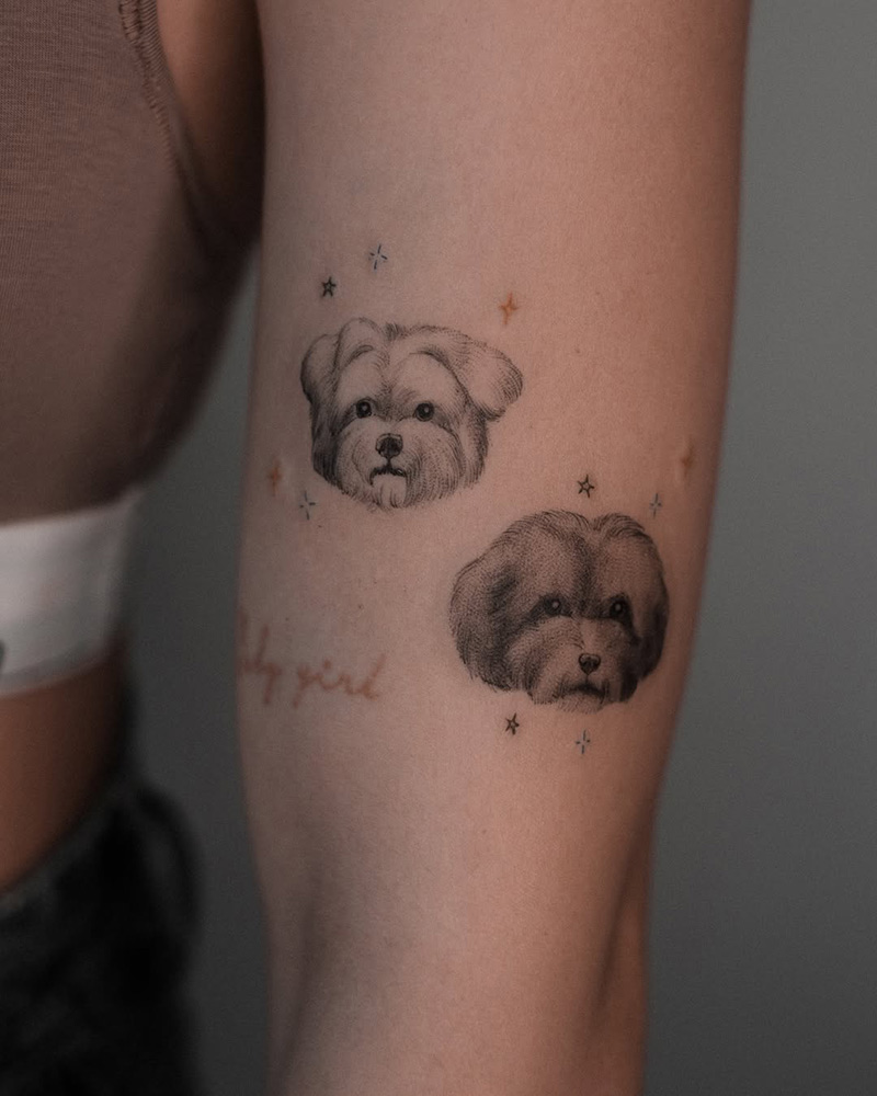 Puppies tattto from HALFMOON Tattoo Studio
