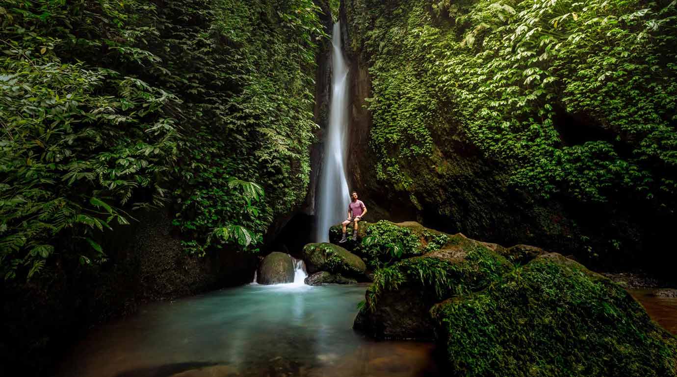 Tourist at Leke Leke Waterfall in Bali