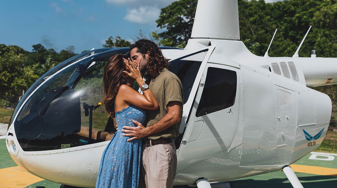 Couple near Balicopter helicopter