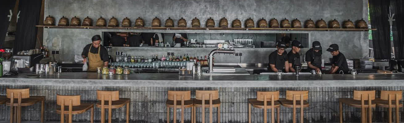 Stylish interior and bar counter in the new restaurant in Bali