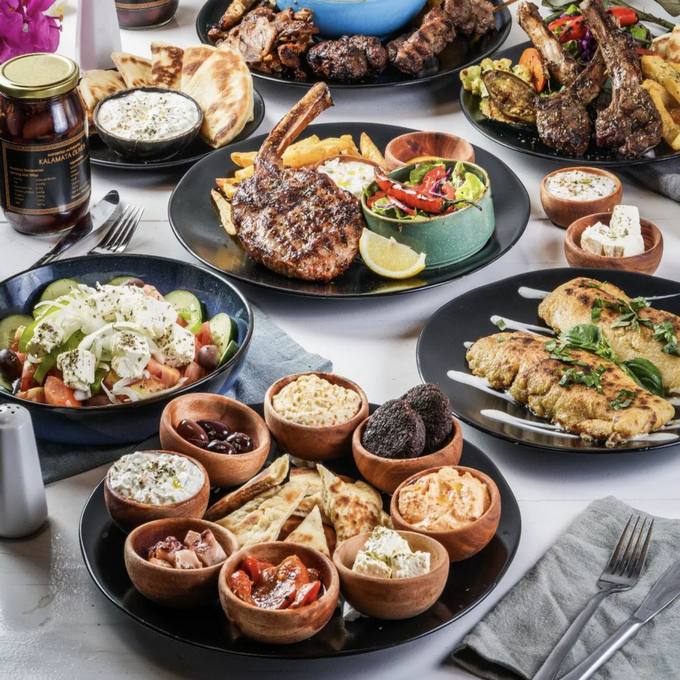 Nostimo Greek Grill - table with greek food