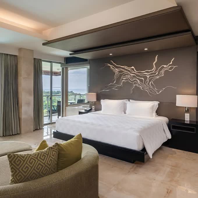 Bedroom in the luxury hotel Rimba Jimbaran