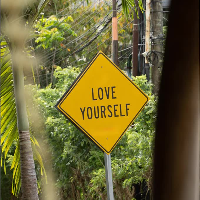 Road sign with the inscription Love yourself