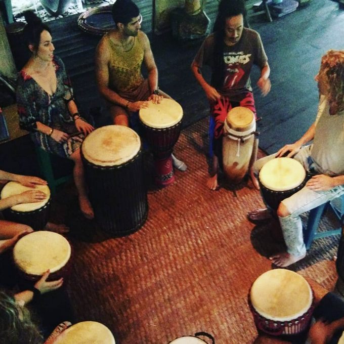 Art of Life Retreats - a group of people playing drums
