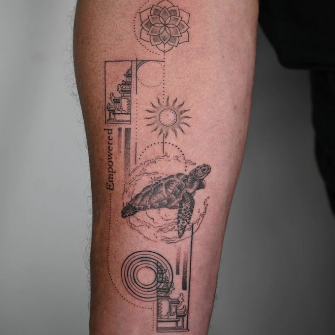 Arm tattoo at Artful Ink Tattoo