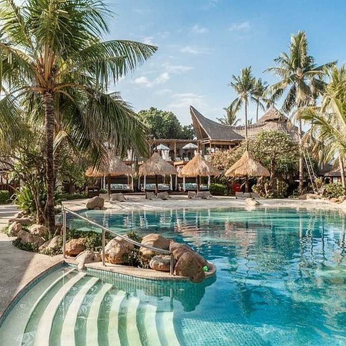 Bali Mandira Beach Resort - pool and places for the rest