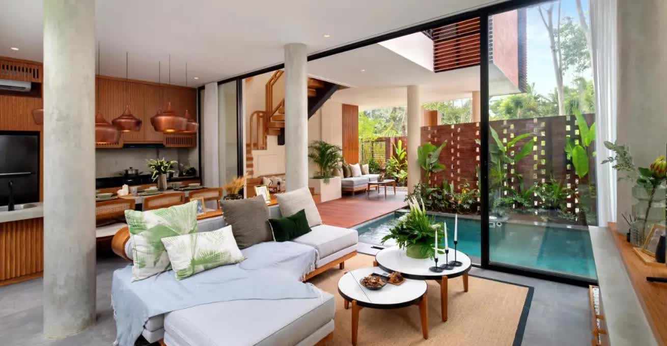Modern interior style of the living room with the pool in Damara Village Ubud Alaya Collection