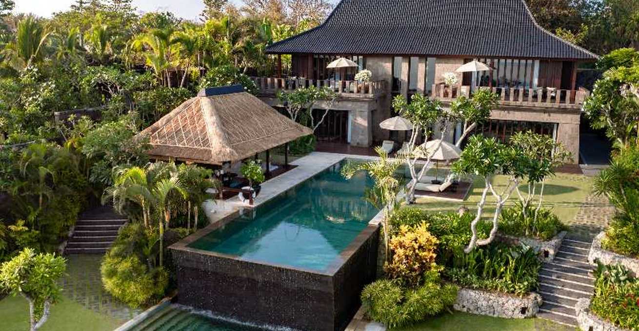 Backyard with swimming pool at Bulgari Resort Bali