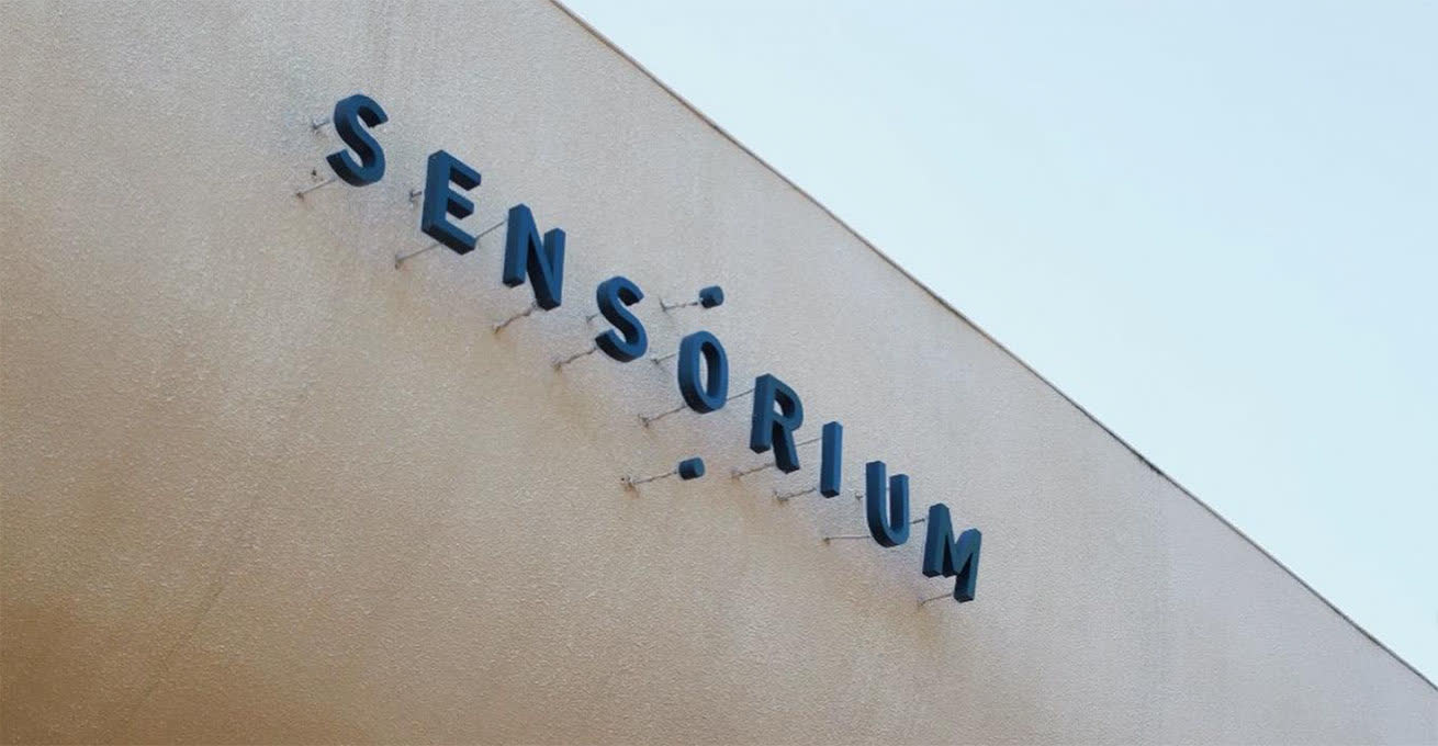 Sign on the building of Sensorium cafe in Bali