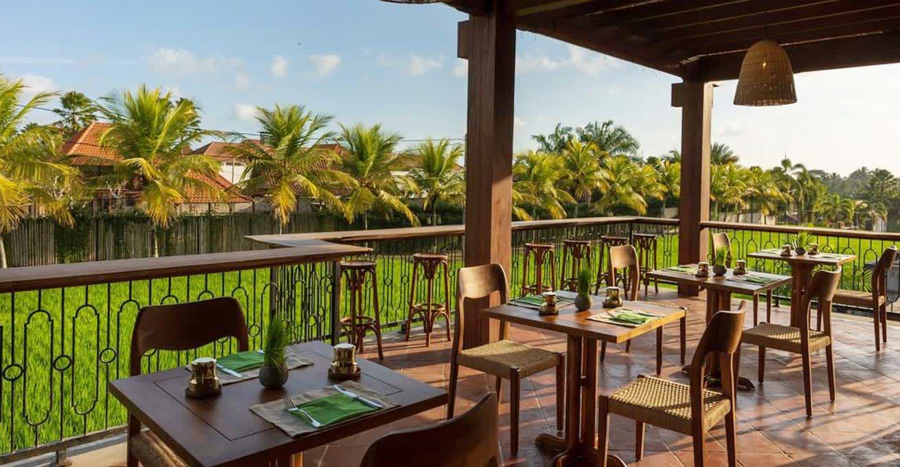 Outdoor tables and chairs at Pistachio Restaurant in Bali