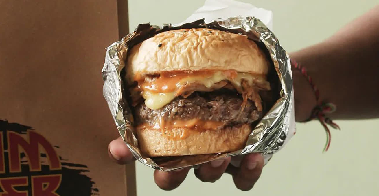 Hot burger in foil in Scream Burger restaurant