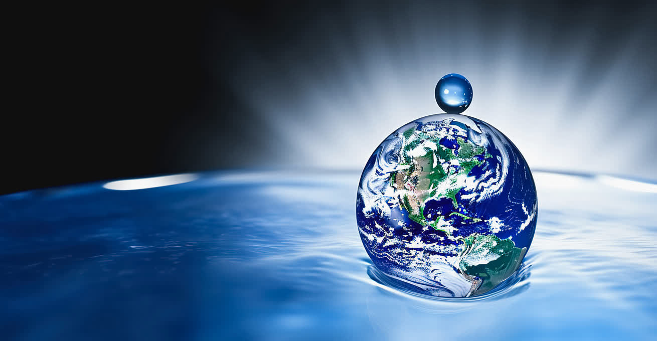 A model of the Earth is lying on the water